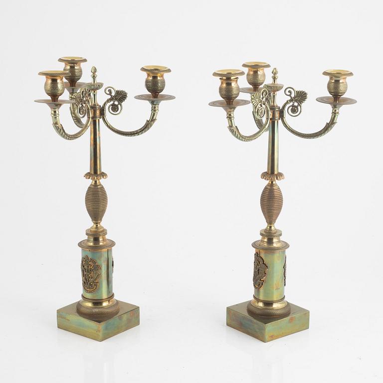 A pair of Empire style candelabra, circa 1900.