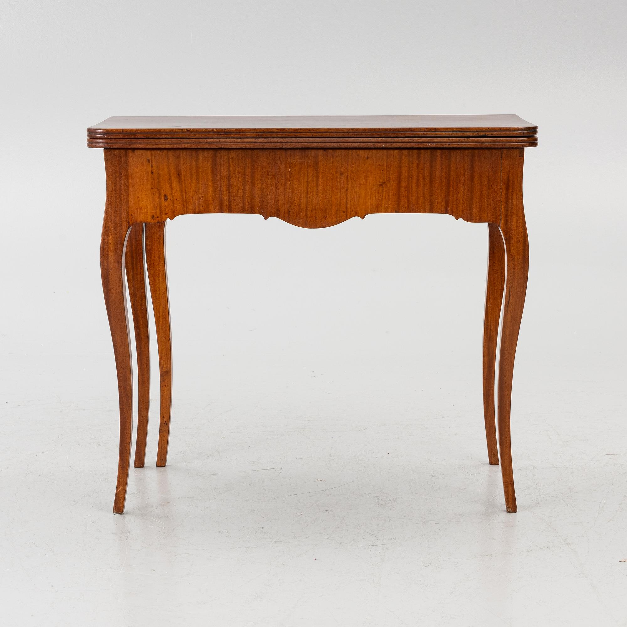 A Rococo game table, 18th century.