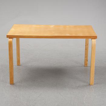 Alvar Aalto, a birch dining table, Artek, Finland, mid 20th Century.