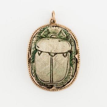 Gold pendant with scarab.