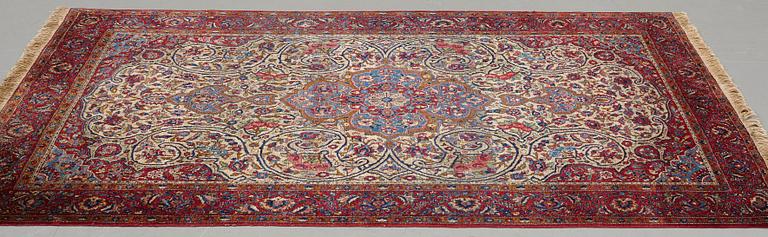 Matto, a semi-antique silk Kashan, ca 212,5-214,5 x 134,5-135,5 cm.
