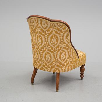 A late 19th century easy chair.