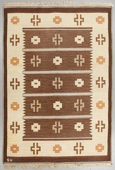 A carpet, flat weave, ca 291 x 202 cm, signed SH.