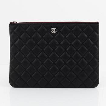 Chanel, a black caviar leather clutch, 2020.