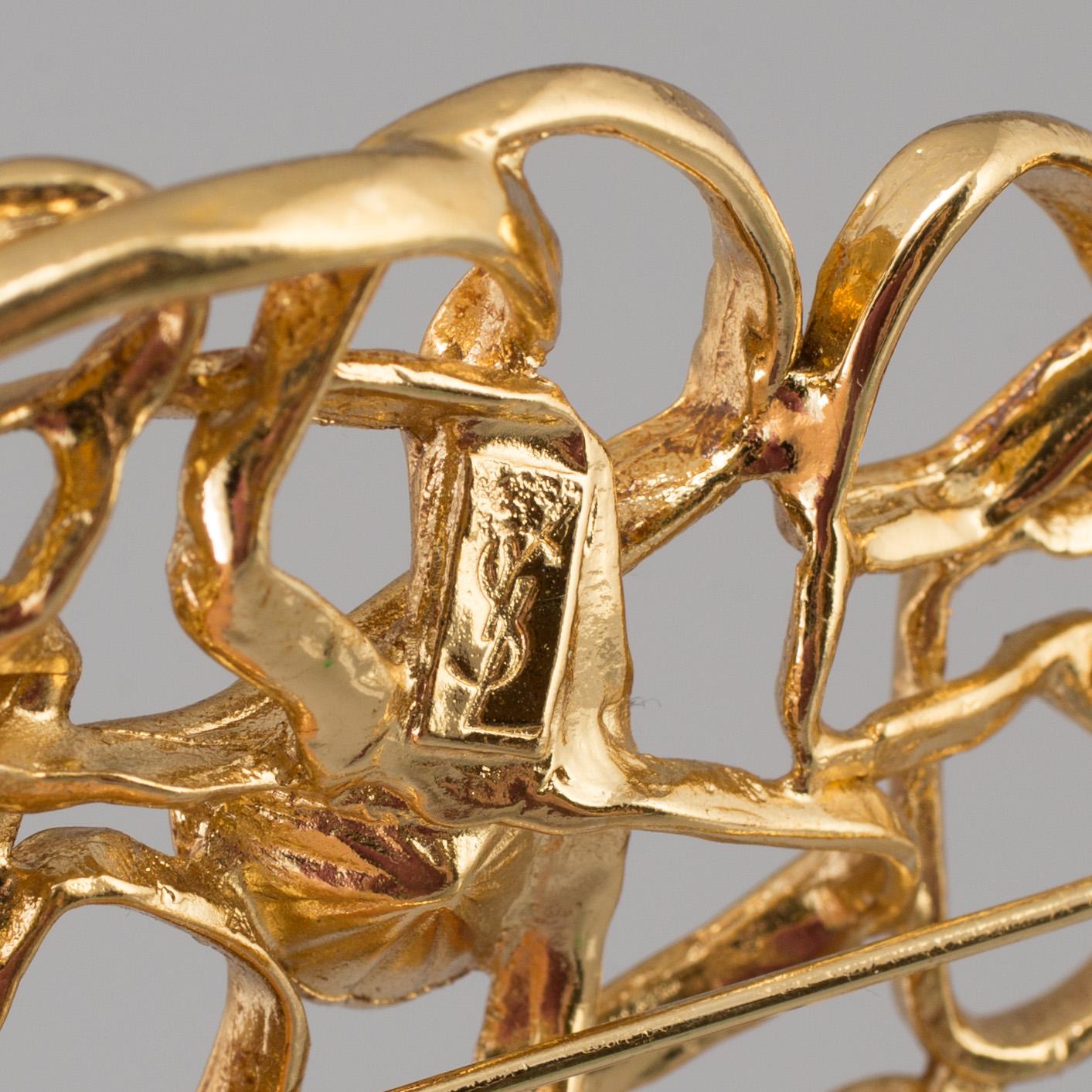 BROSCH, Yves Saint Laurent.