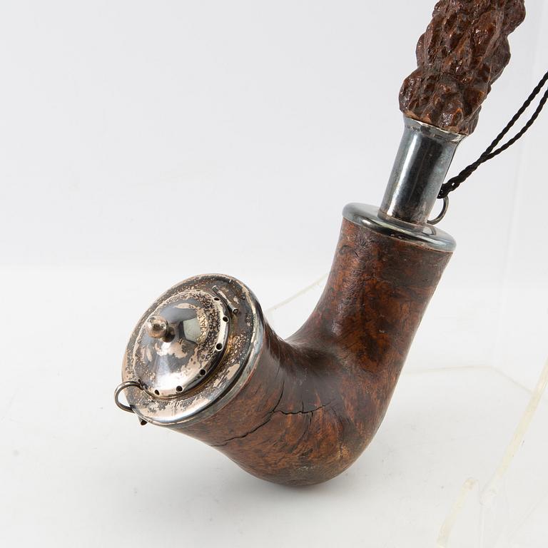 Long pipe  Carved wood with a silver mount Hasa Malmö 1986.