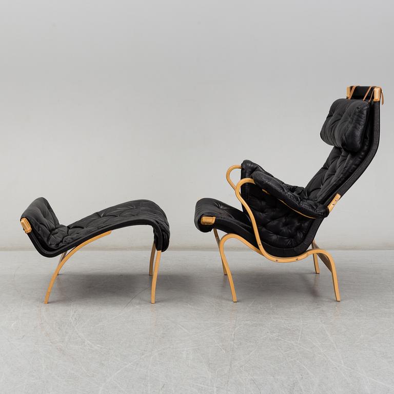 BRUNO MATHSSON, easy chair and foot stool, 'Pernilla', Dux, second half of the 20th century.