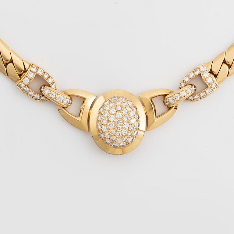 A Cartier 18K gold necklace set with round brilliant-cut diamonds.