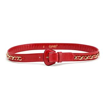 CHANEL, a red leather and gold chain belt.