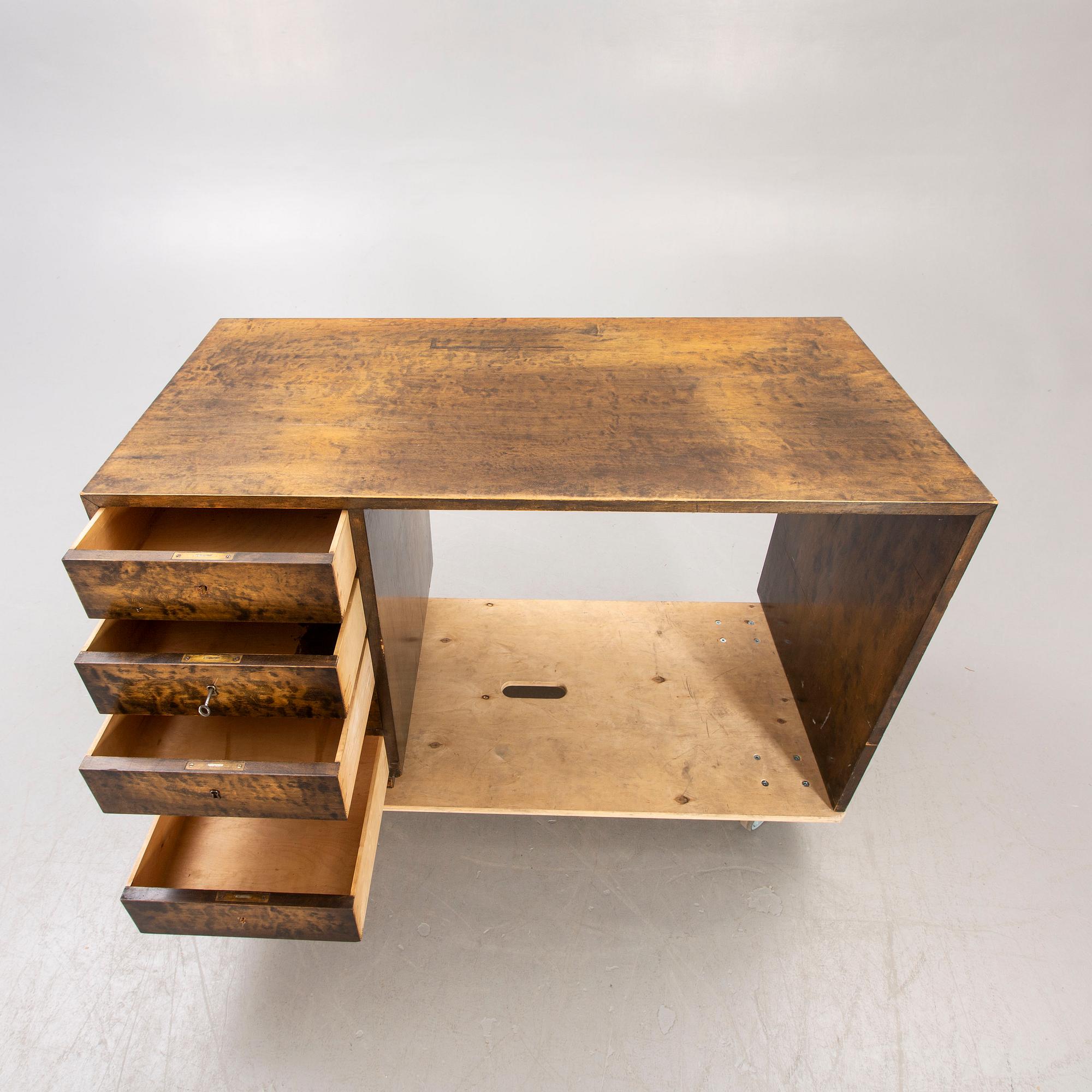 A 1930s birch desk.