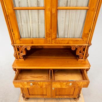 A Neo Rococo elm mid 1800s display cabinet.