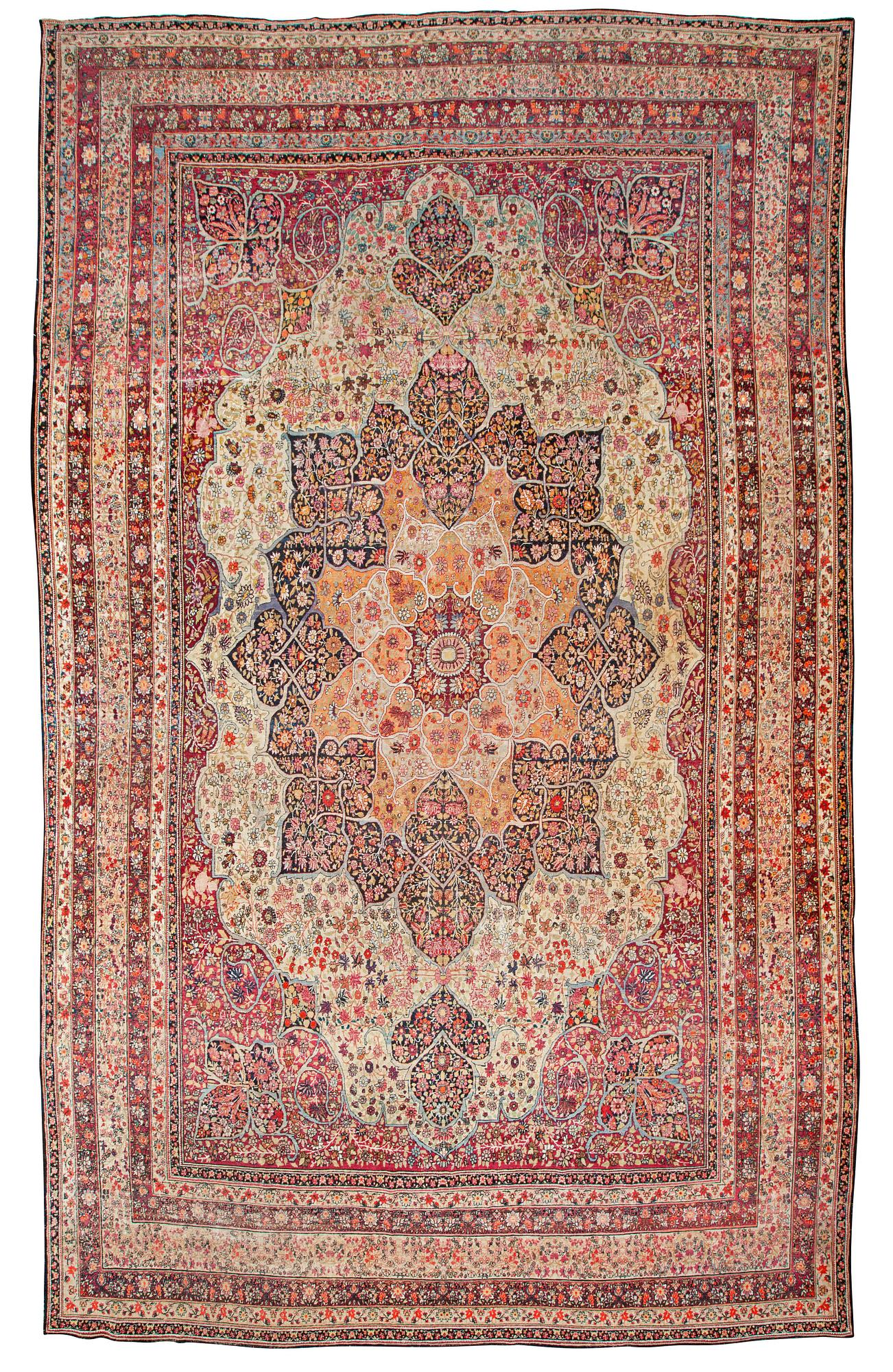 An antique Kerman Laver carpet, c. 586 x 385 cm.