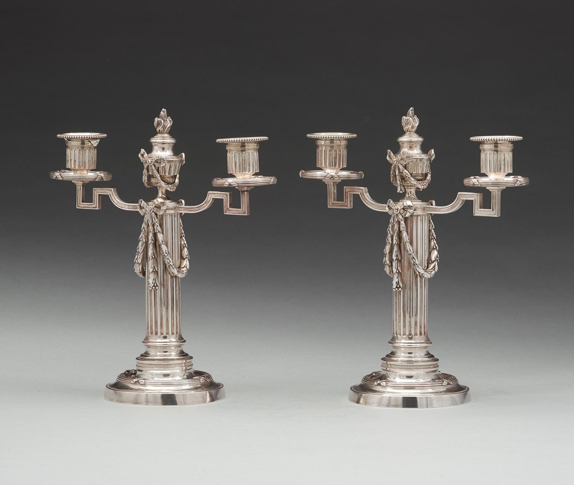 A pair of Fabergé, silver candelabra, workmaster Julius Rappoport, S.t Petersburg before 1899.