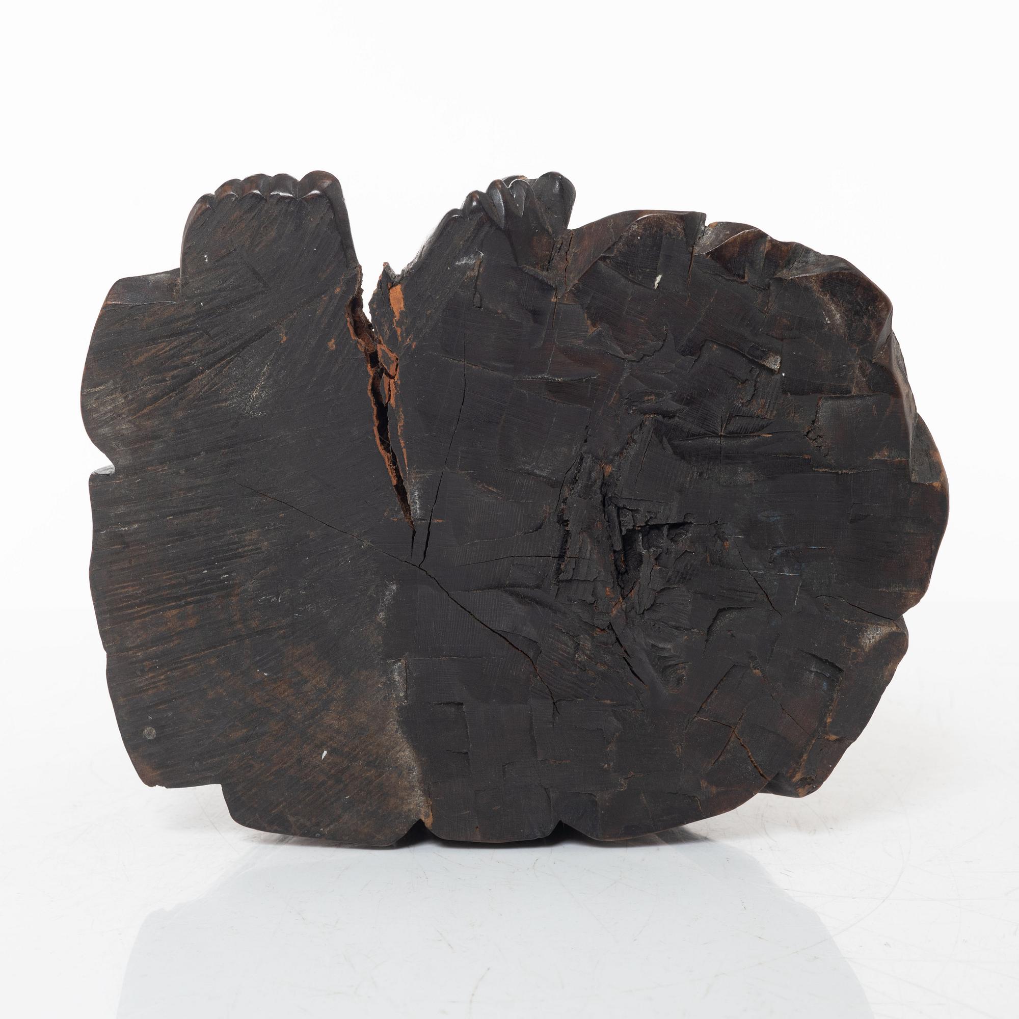 A Chinese wooden figure of Budai with silver inlays, Qing dynasty (1644-1912).