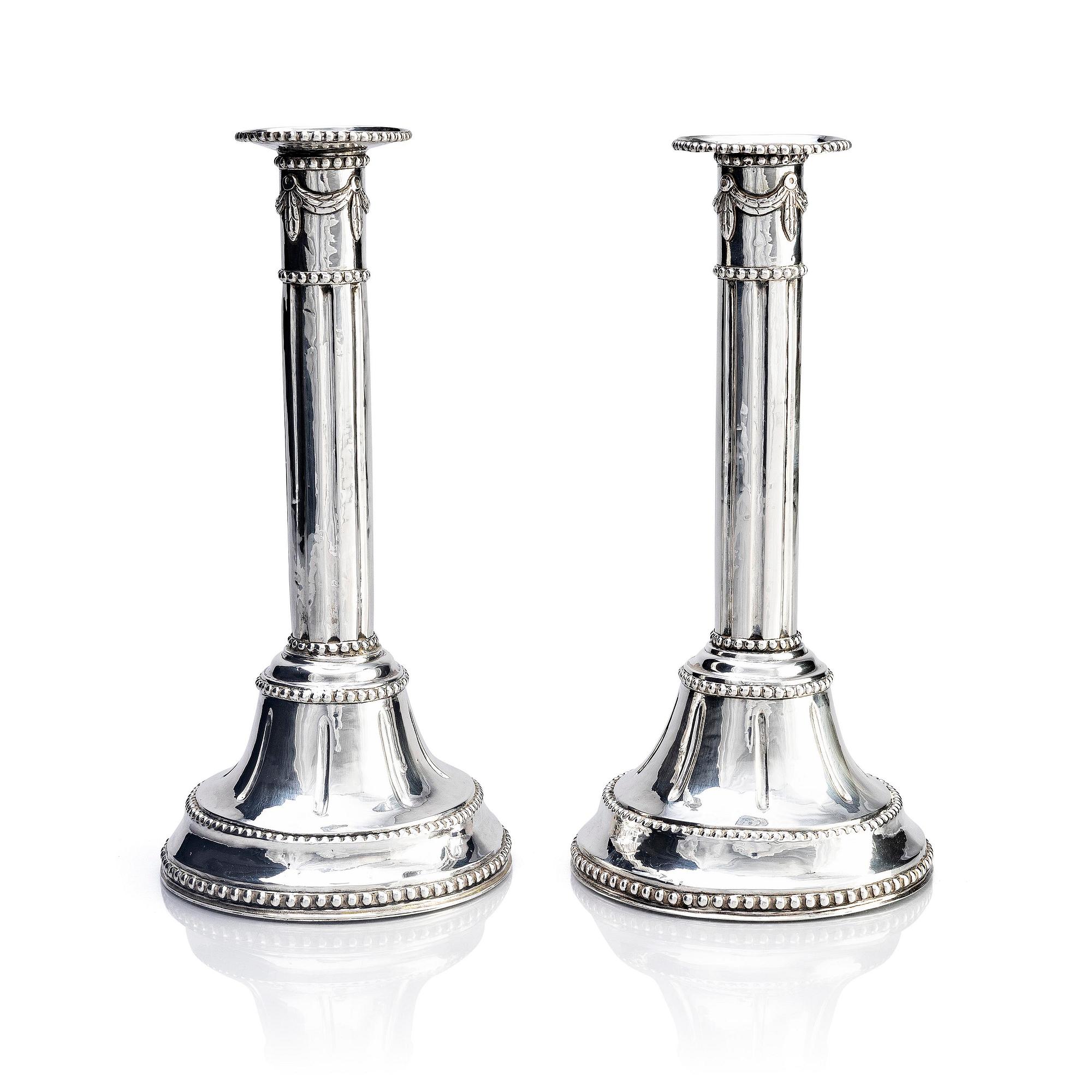 A pair of Swedish 18th century silver candlesticks, marks of Fredric Meyer, Karlshamn 1787.