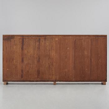 Carl Malmsten, a walnut bookcase, Sweden, 1930s.