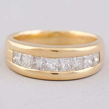 A RING, princess cut diamonds, 18K gold.