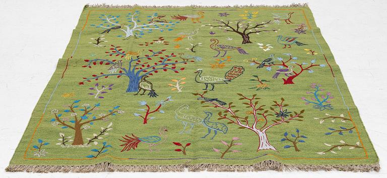 A hand-embroidered Kilim rug, c. 200 x 150 cm.