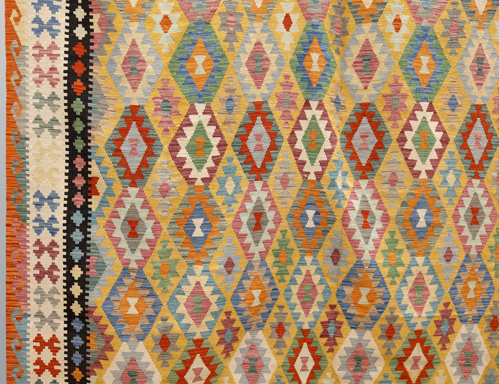 A kilim carpet, ca 486 x 304 cm.