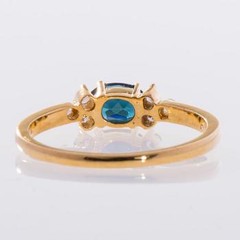 RING, 18K guld, blågrön turmalin ca 0,27 ct samt 6 små diamanter,  finska stämplar. Vikt 2,6 g.