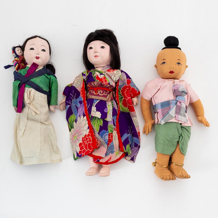 A set with three Asian dolls, early 20th Century.