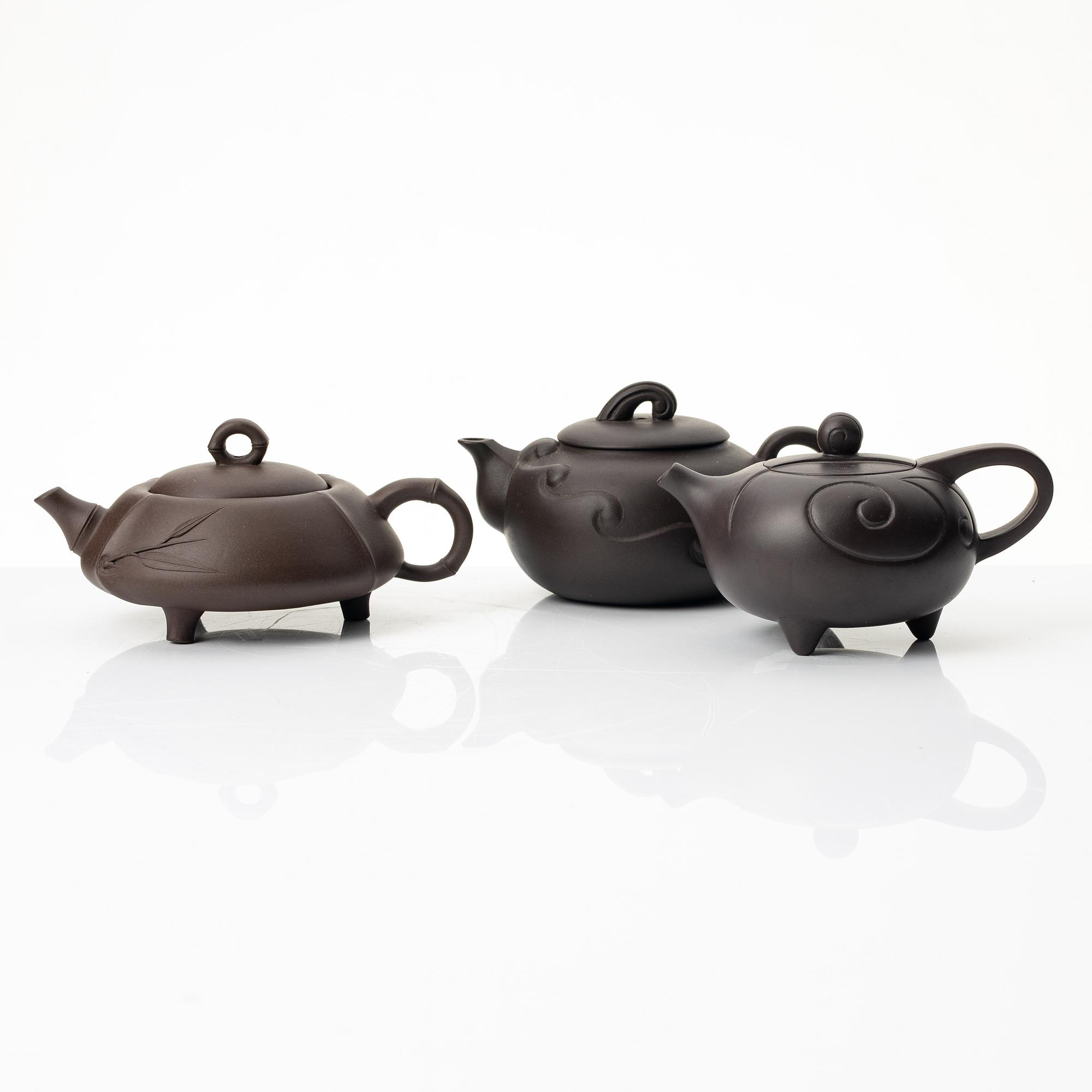A group of four Chinese brown yixing teapots, 1980/90s.