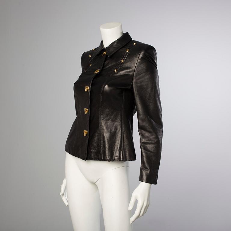 A leather jacket by Escada, in size 36.