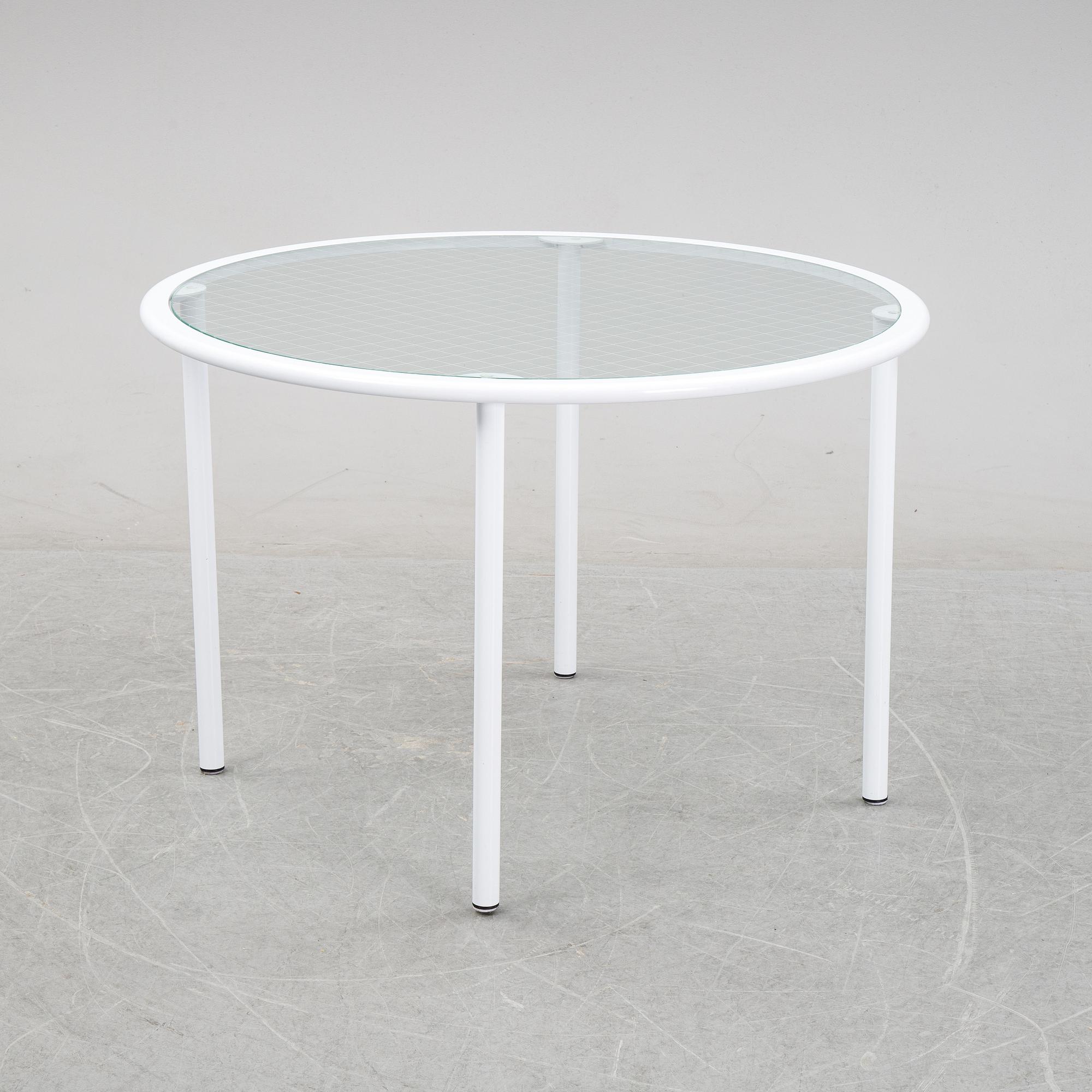 Giandomenico Belotti, attributed to, a griddled glass and metal dining table, by Fly Line, Italy, 1970s.