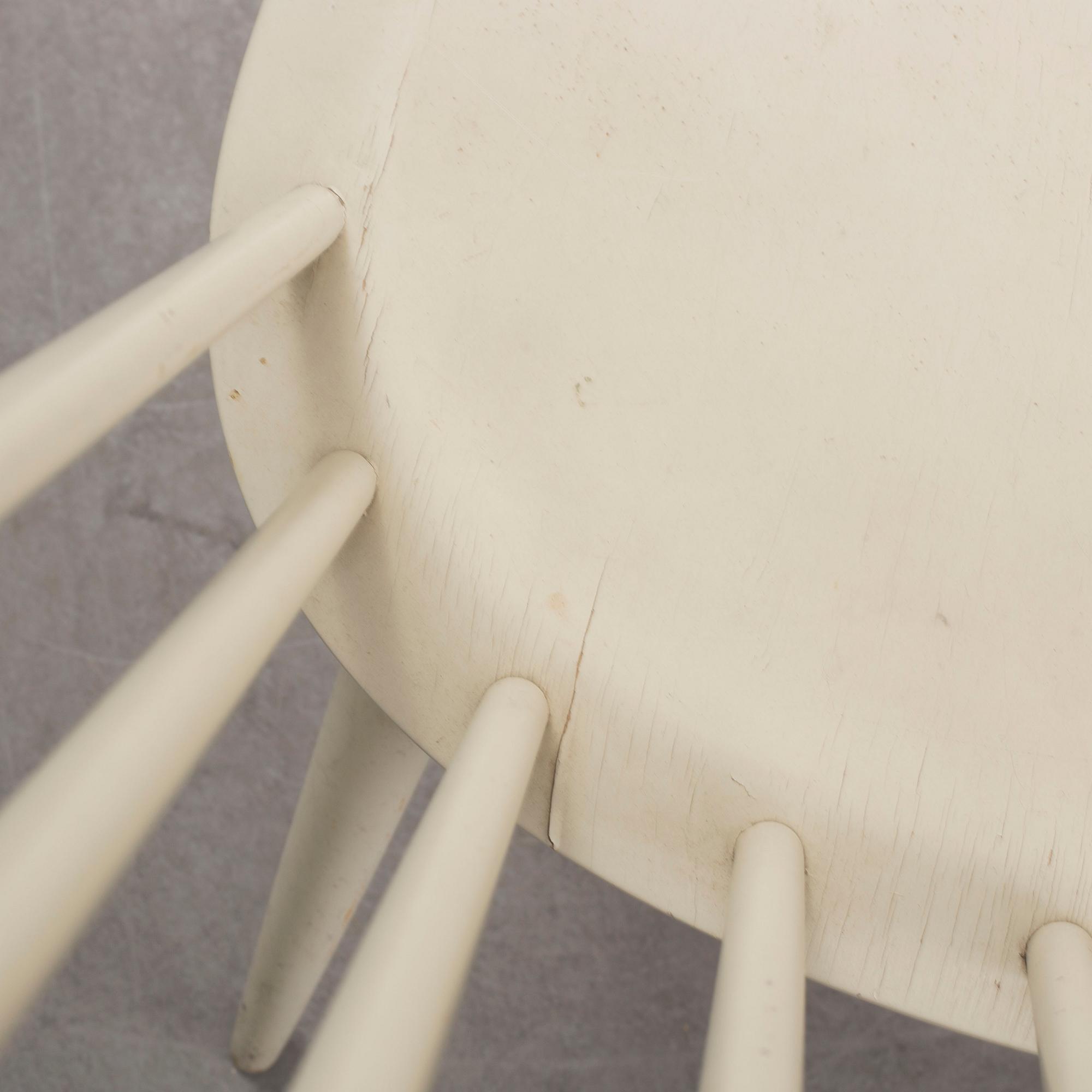 A second half of the 20th century 'mademoiselle' chair by Ilmari Tapiovaara.