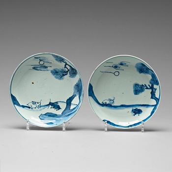 800. Two blue and white Transitional dishes, 17th Century.