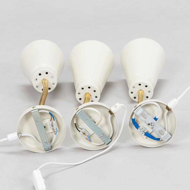 A set of three mid-20th century wall lights, model AH6, for Itsu Finland.