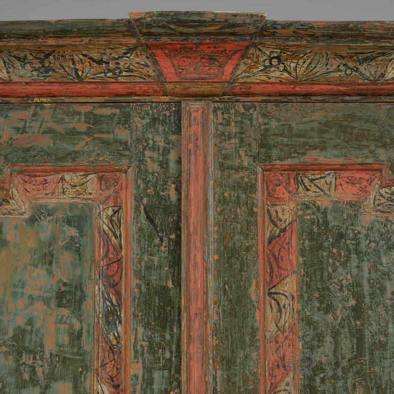 A Swedish polychrome-painted rococo cabinet, late 18th century.