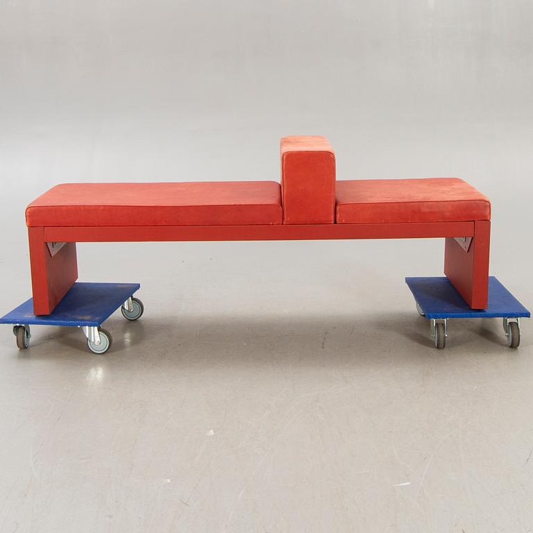 An Italian leather bench later part of the 20th century.