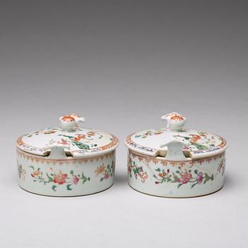 A pair of famille rose 'double peacock' condiment dishes, Qing dynasty, Qianlong (1736-95).