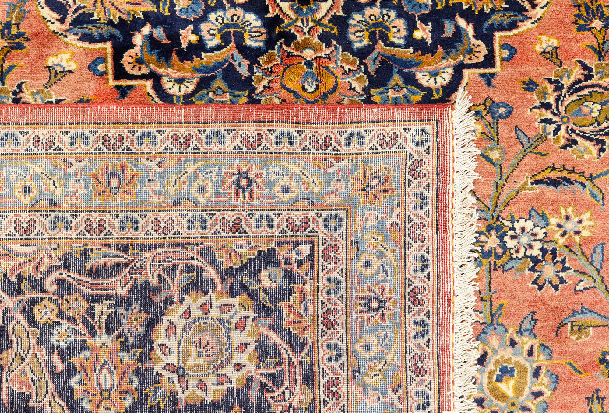 A Keshan older carpet, 430 x 305 cm.