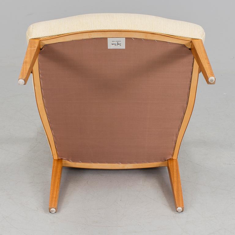 A pair of Josef Frank 969 armchairs, Svenskt Tenn.