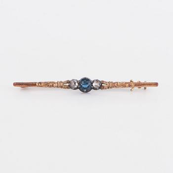Synthetic blue stone and rose-cut diamond brooch.