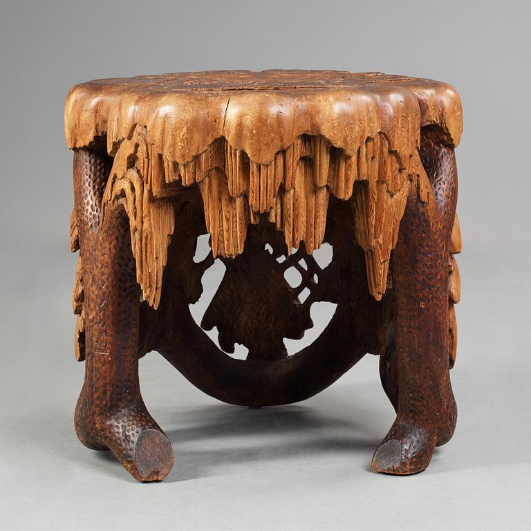 Knut Fjaestad, A Knut Fjaestad Art Nouveau sculptured pine table, Sweden ca 1900.
