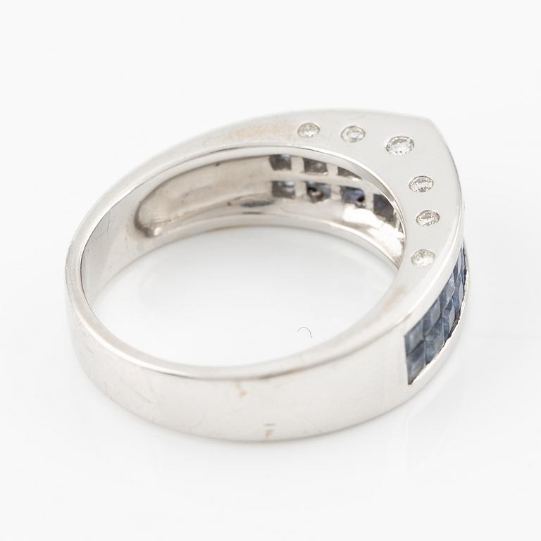 A ring 18K white gold with blue sapphires and round brilliant-cut diamonds.