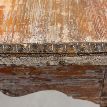 An 18th century rococo table.