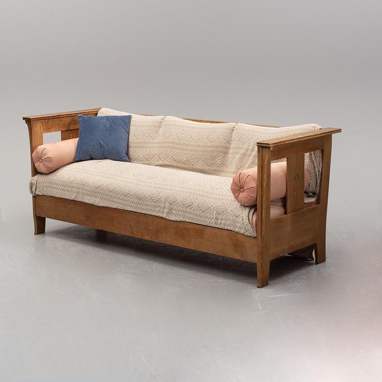 A eary 20th Century pine sofa attributed to Carl Westman.