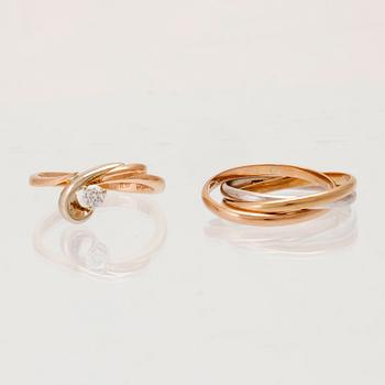 Rings, 2 pcs, 14K gold and round brilliant-cut diamond.