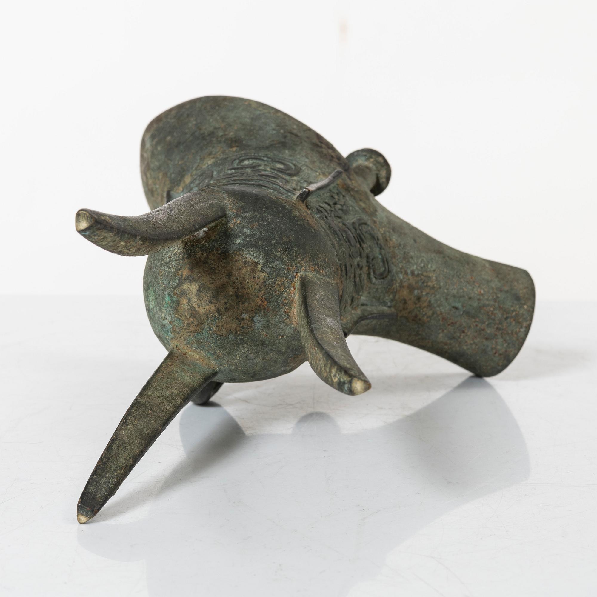 An archaisitic bronze Jue vessel, Qing dynasty.