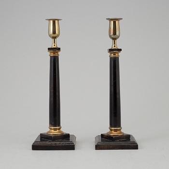 A pair of late 19th century candlesticks.