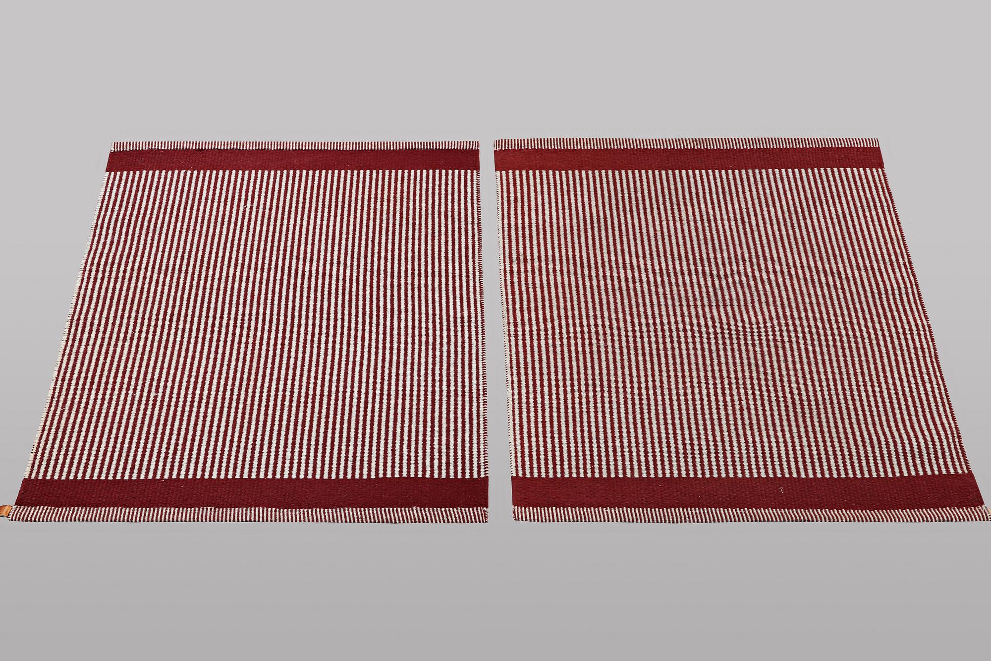 A pair of carpets, Kasthall, ca. 94 x 76 cm & ca. 94 x 86 cm.