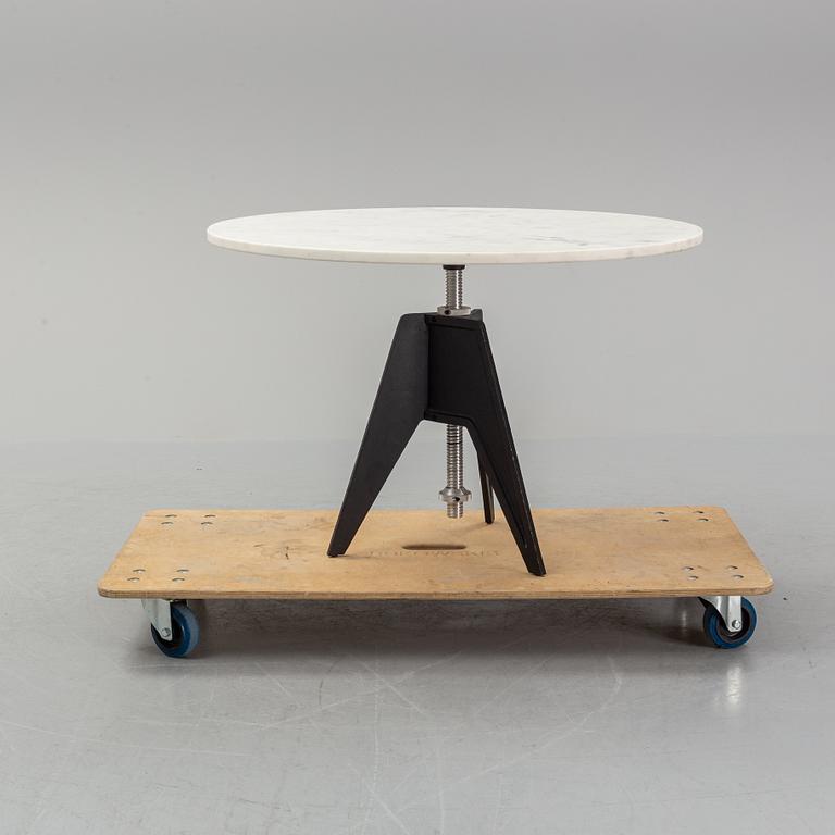 A Tom Dixon Screw Café Table.