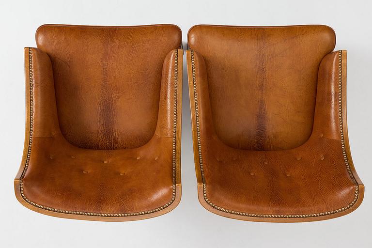 Frits Henningsen, a pair of armchairs, mid-20th century.