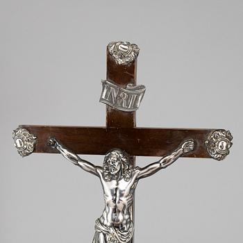 An 18th century silver and wood crucifix.