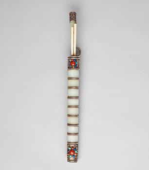 481. A Tibetan knife and chopsticks in a scabbard, 19th Century. With signature to the nephrite.