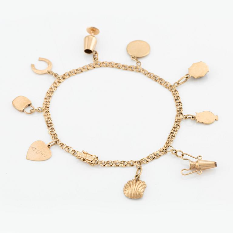 Armband, 18K guld, med berlocker.